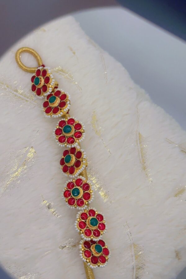 RED RUBY FLORAL KUNDAN BRACELET.