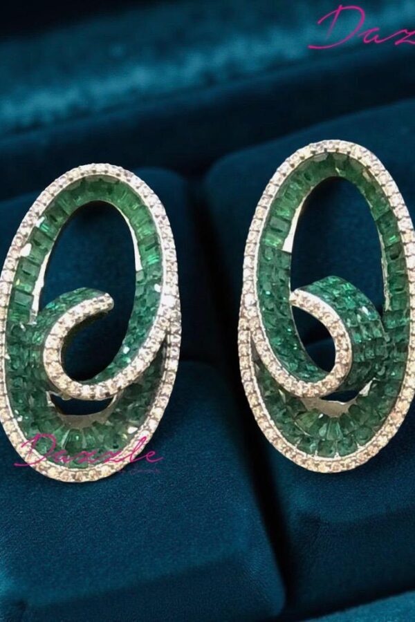 Alloy-based studs with shimmering green zirconia stones.