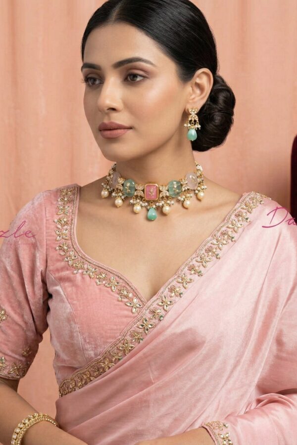 Premium Kundan setting with intricate enamel artistry